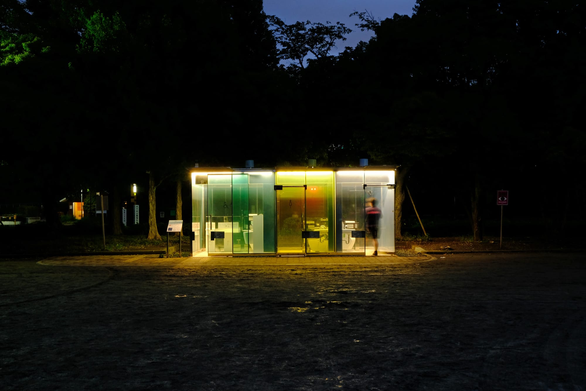 A public bathroom designed as part of the Tokyo Toilet art project is illuminated at night